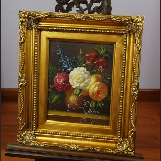 Kwiaty obraz w złotej ramie 