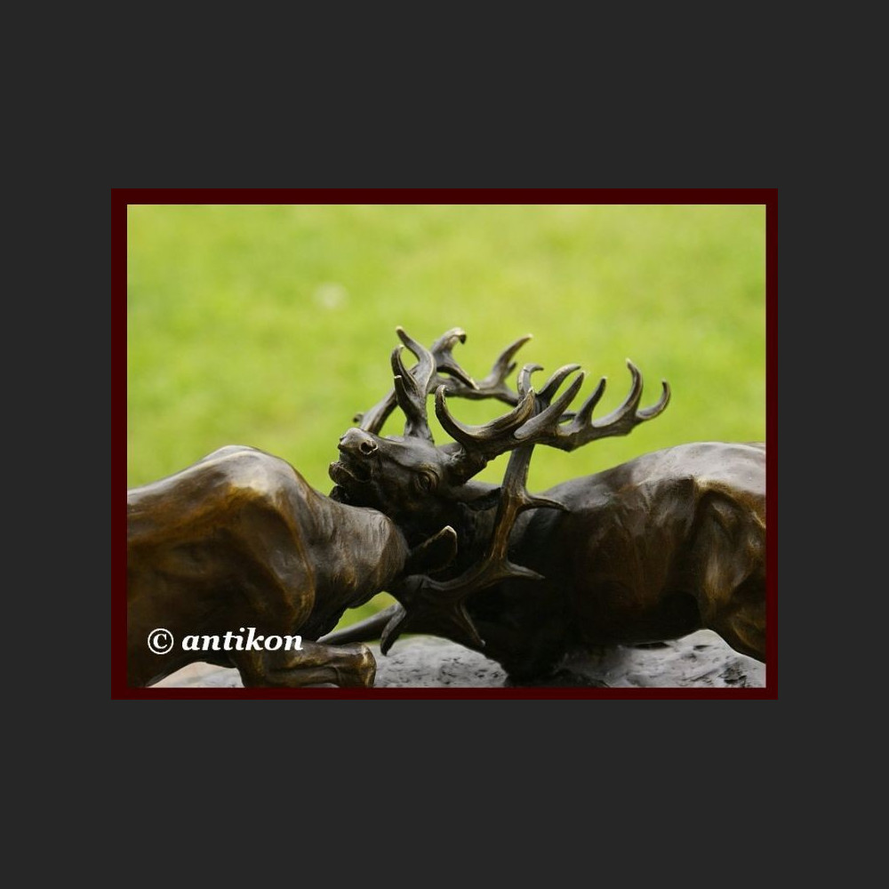 Prezent dla myśliwego jelenie w walce rzeźba 