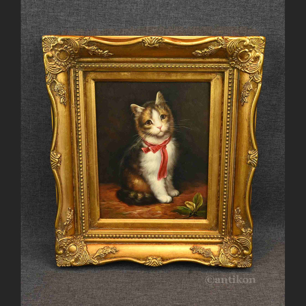 Obraz kota z czerwoną kokardą 