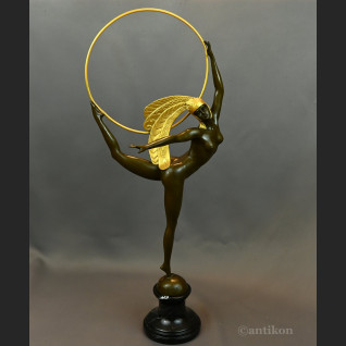 Rzeźba Tancerka w złotym pióropuszu art deco 