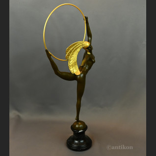 Rzeźba Tancerka w złotym pióropuszu art deco 