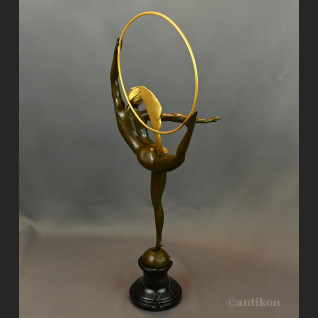 Rzeźba Tancerka w złotym pióropuszu art deco 