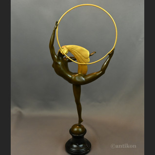 Rzeźba Tancerka w złotym pióropuszu art deco 