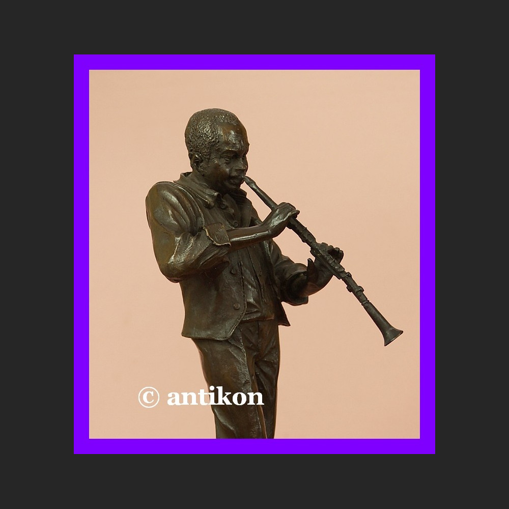 Figura z brązu Louis Armstrong klarnecista 