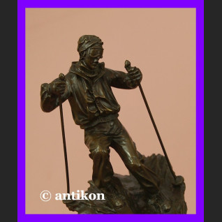 Figurka z brązu Narciarz dynamiczna rzeźba 