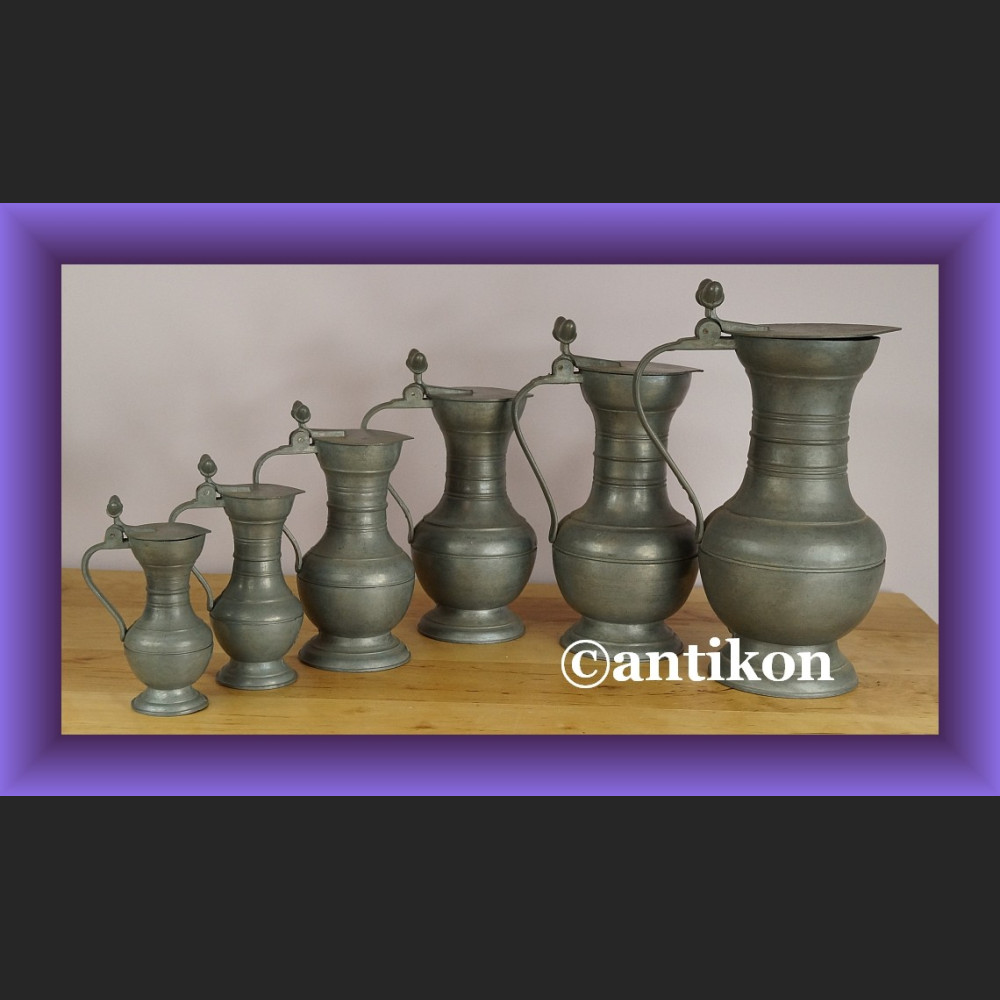 Oryginalny komplet 6 dzbanków z cyny 